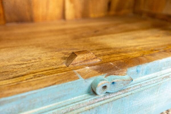 A close up of the wood on a wooden table