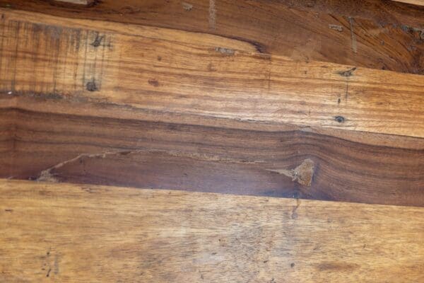 A close up of the wood grain on the floor.