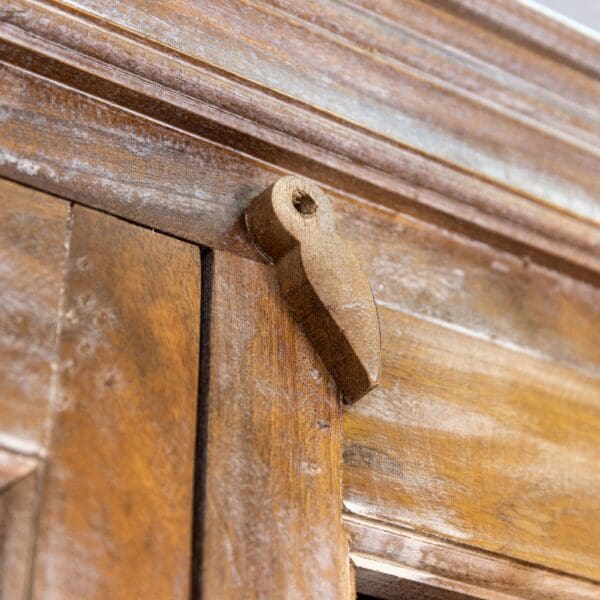 A wooden door with a handle on it.