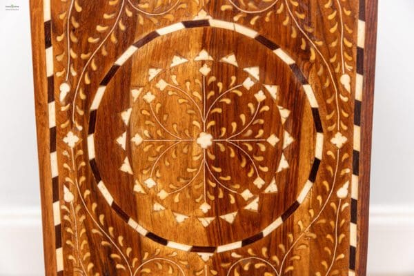 A close up of the wood grain on a wooden table