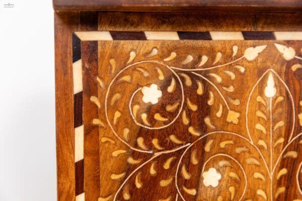 A close up of the wood grain on a wooden table