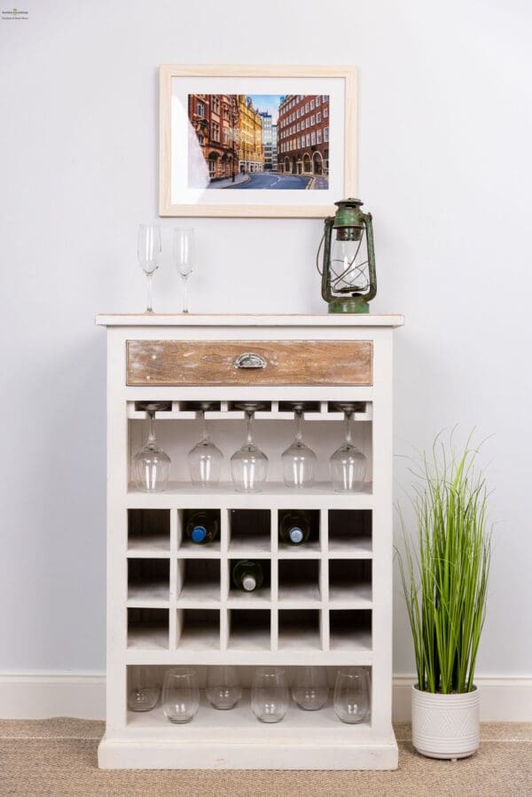 A white wine rack with a drawer and glass holder.