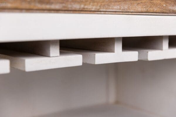 A close up of the shelves in a kitchen