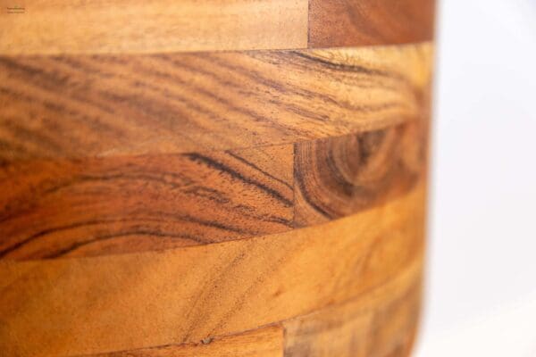 A close up of the wood grain on a wooden bowl