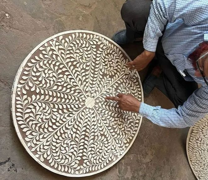 A man is working on a basket