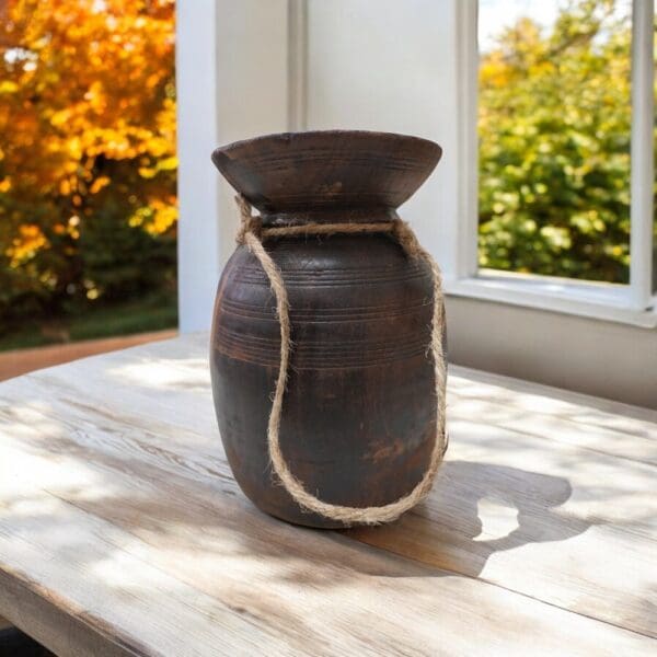 Hand-crafted vintage acacia wood vase.