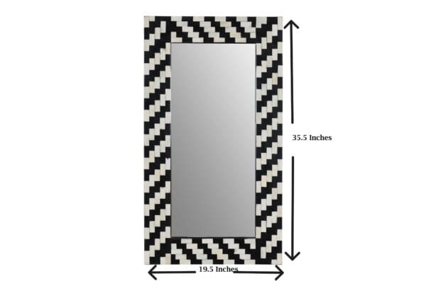 A mirror with black and white stripes on it.