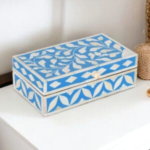 A blue and white box sitting on top of a table.