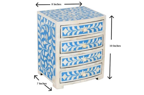 A blue and white patterned chest of drawers with measurements.