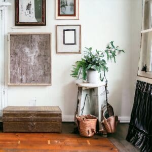 Vintage metal case in a room with many pictures on the wall