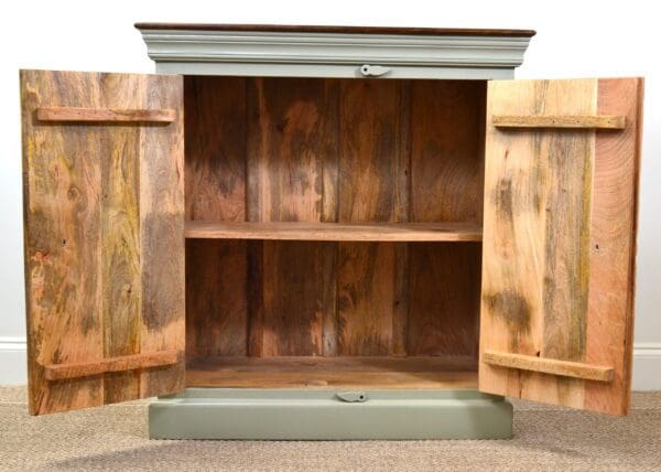 A wooden cabinet with two shelves and one drawer.