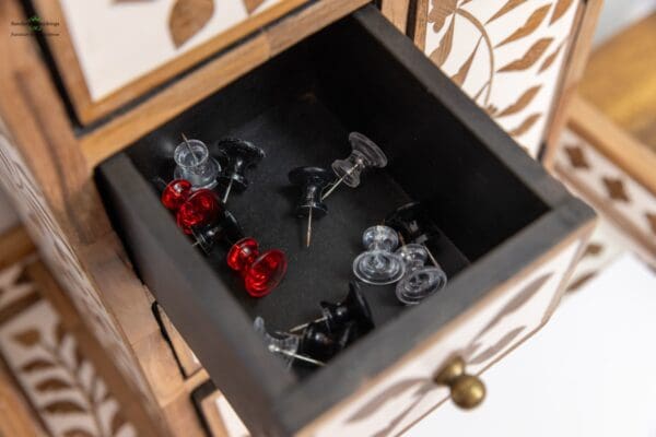 A drawer with some wine glasses in it