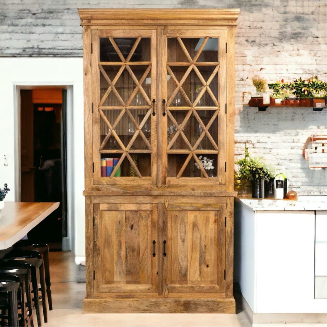 A large wooden cabinet in the middle of a kitchen.