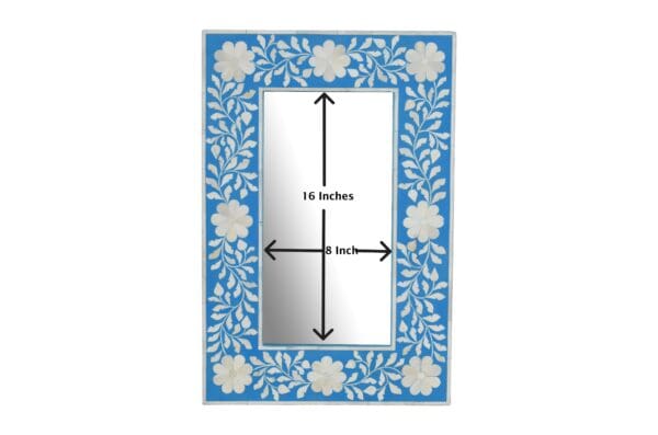 A mirror with floral design and measurements