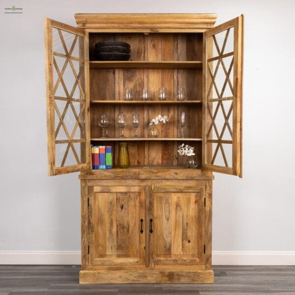 A wooden cabinet with glass doors and shelves.