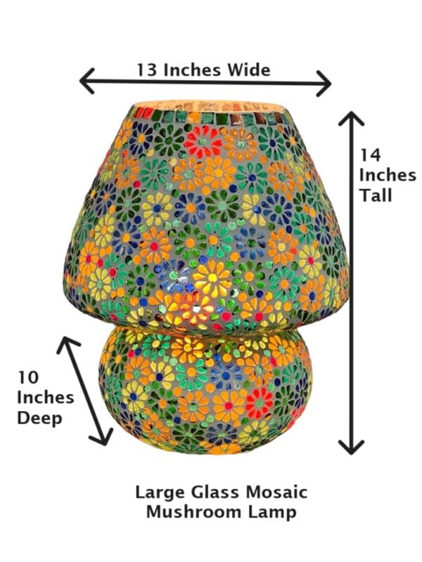 A large glass mosaic lamp with flowers on it.