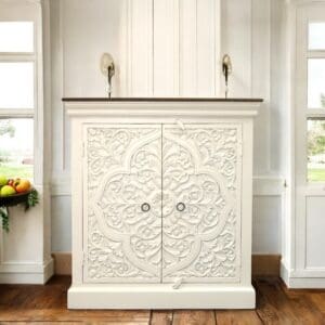 hand-crafted carve d buffet cabinet staged in a home