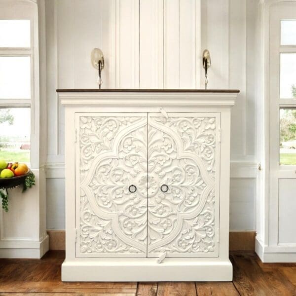 hand-crafted carve d buffet cabinet staged in a home