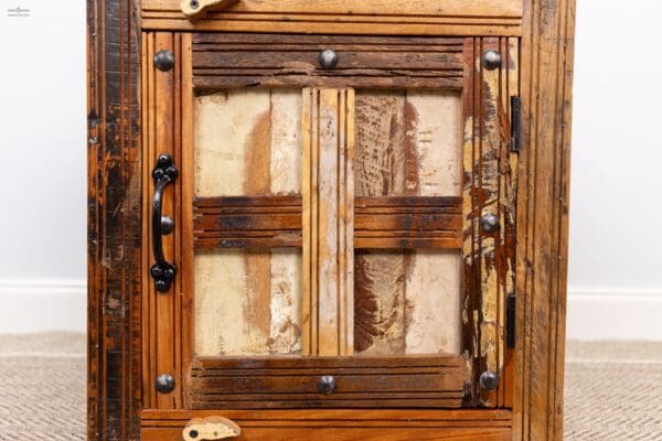 A wooden door with some wood panels on it