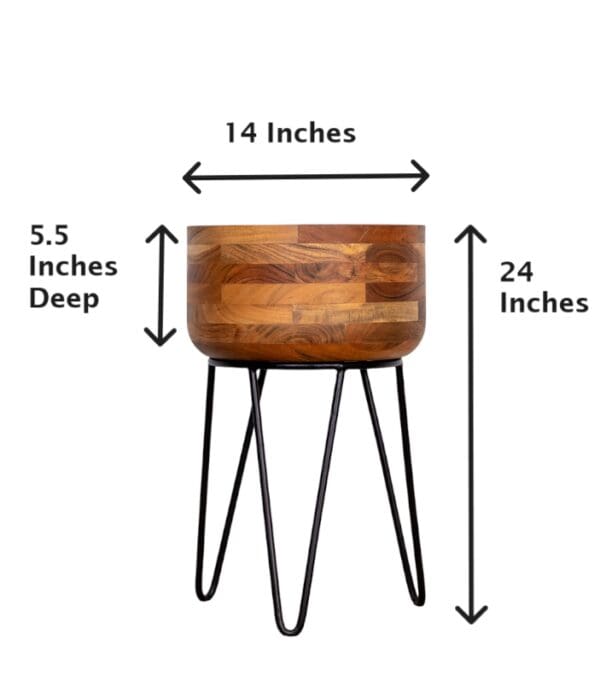 A wooden bowl sitting on top of a metal stand.