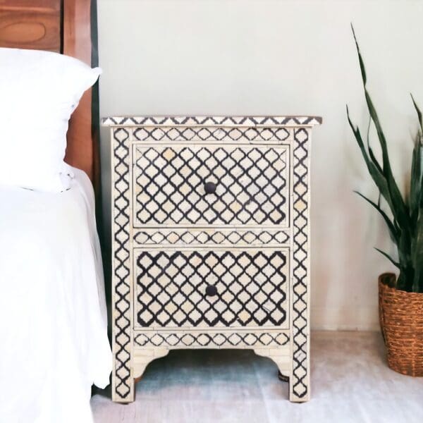 black and white nightstand staged in a bedroom