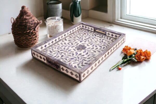 A tray with a floral design on it