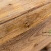 A close up of the wood grain on a table