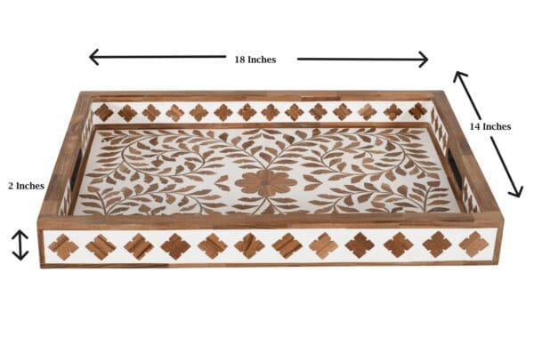 A wooden tray with brown and white design on it.