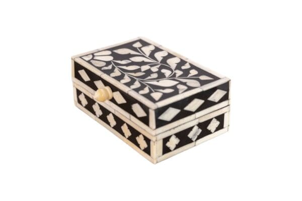 black and white trinket box on a white background