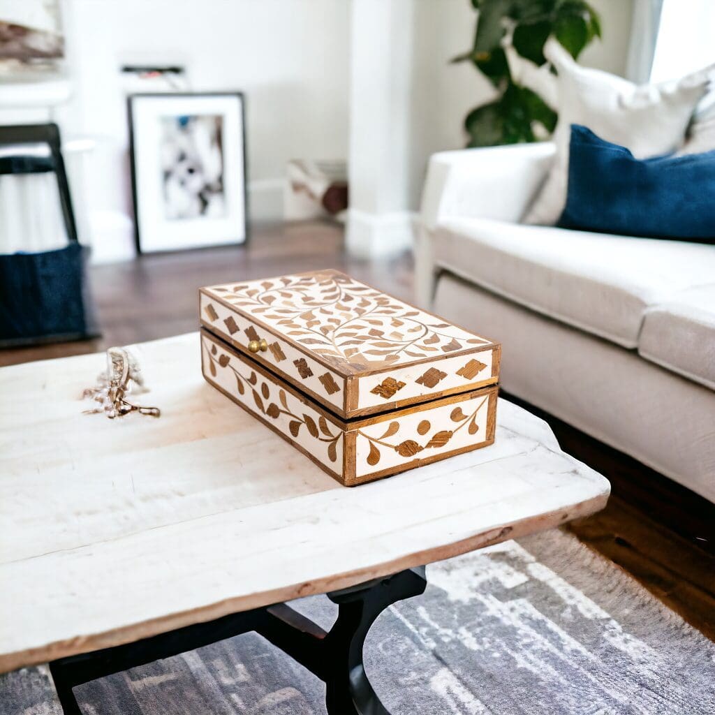 A coffee table with two boxes on it