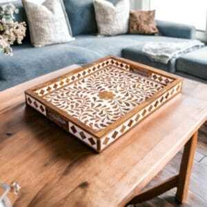A wooden tray on top of a table.