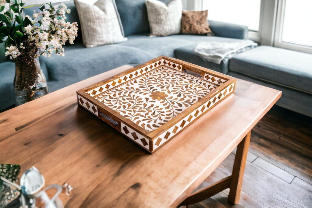A wooden tray on top of a table.