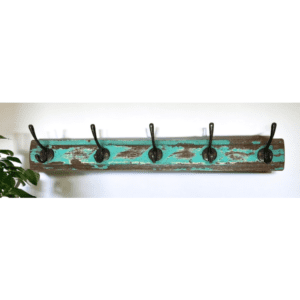 hand-crafted 5-hook coat rack hanging on a wall