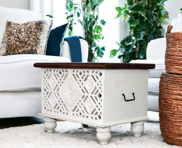 small hand-carved geometric trunk staged in a living room