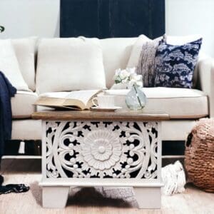 small mandala cut-out trunk with square legs staged in a living room