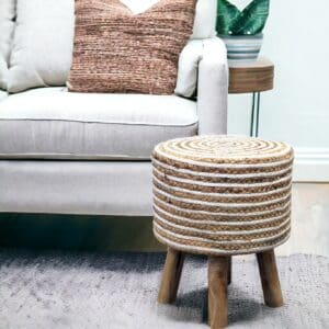 hand-crafted jute stool option natural and white staged in a living room