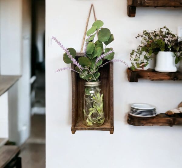 staged with a mason jar and dry flowers