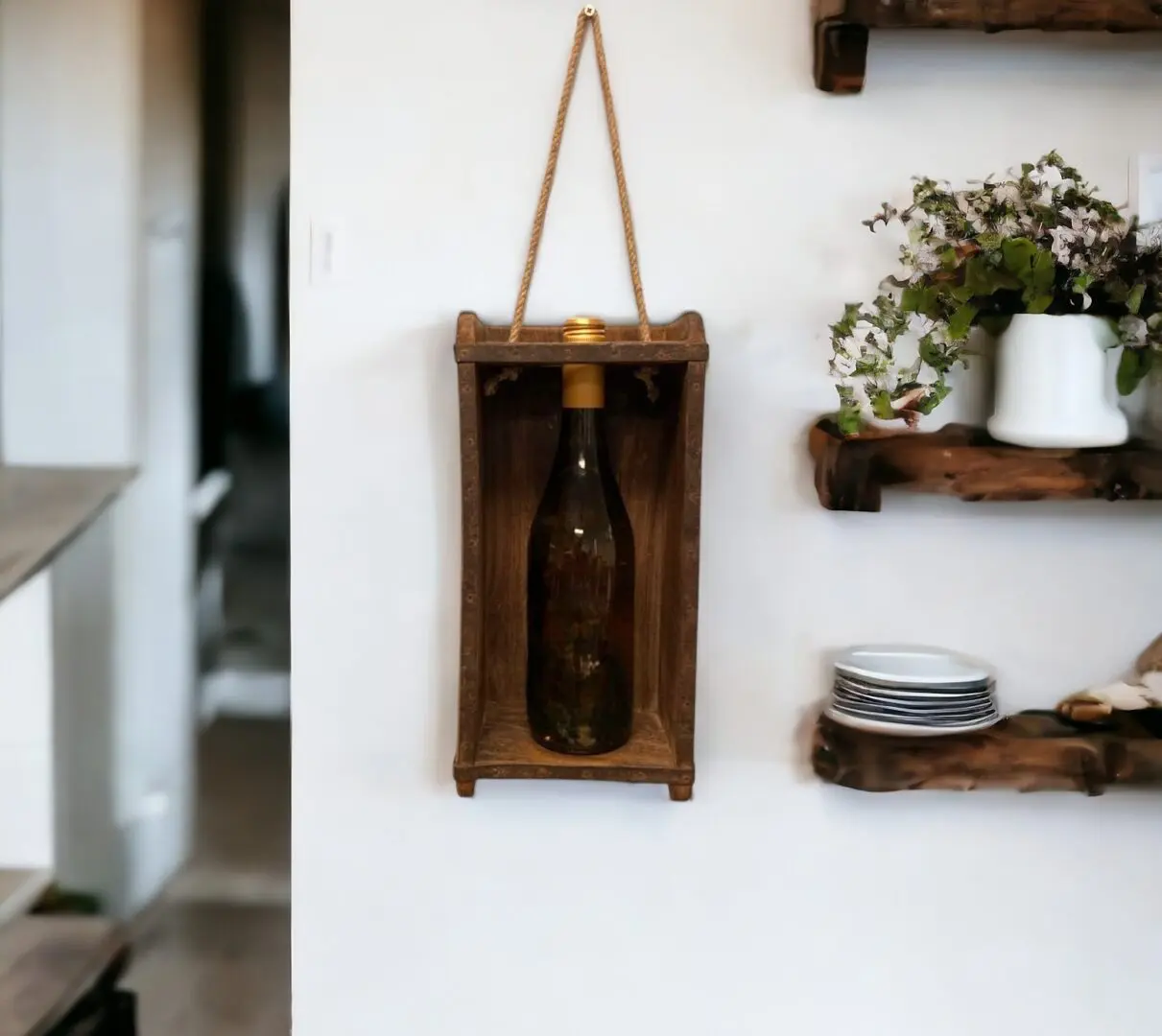 vintage brick mold wall hanger with a bottle of wine staged on a rustic wall