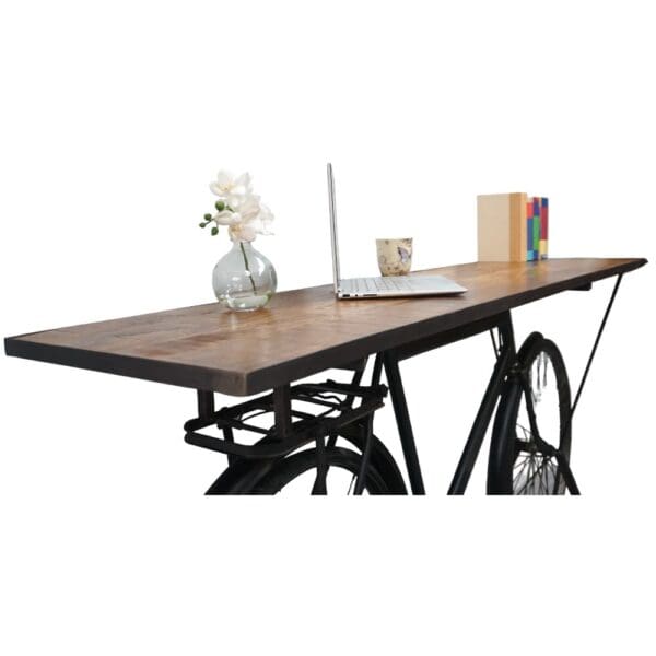 a vintage bicycle converted into a unique console table on a white background