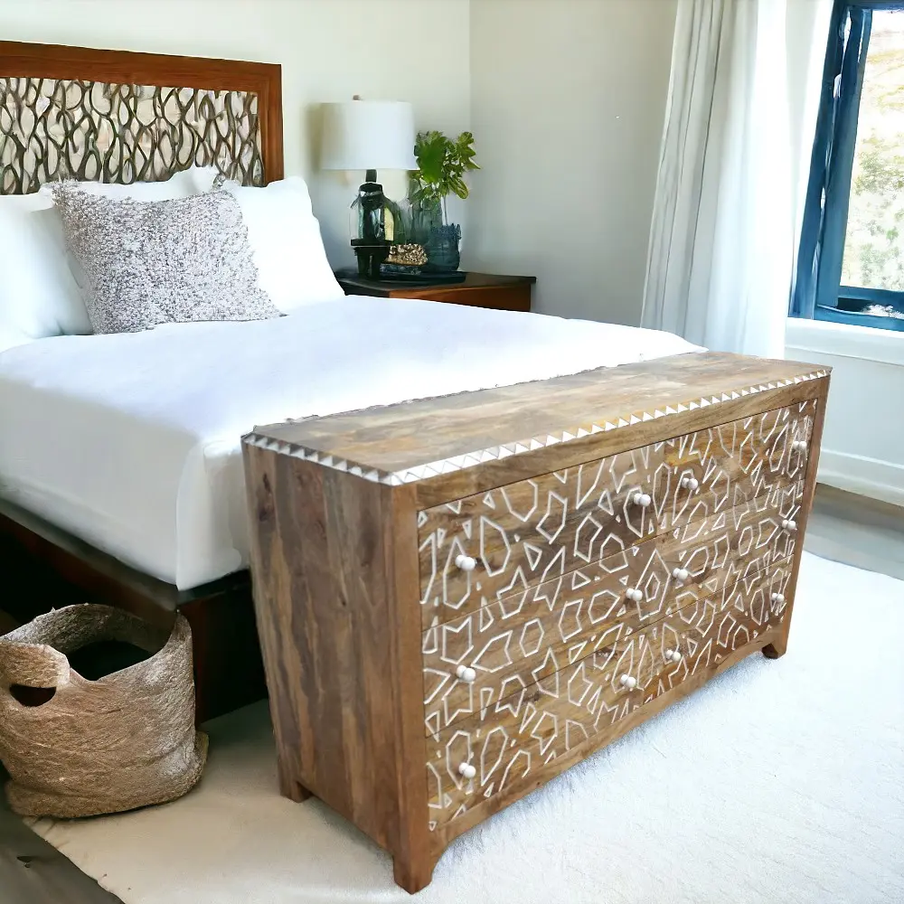 Hand-crafted chest of drawers staged in a bedroom