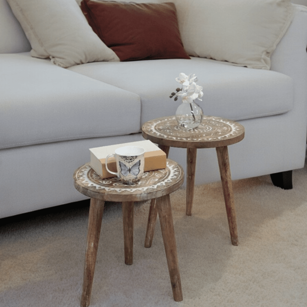 set of two hand-crafted wood tables staged in a living room