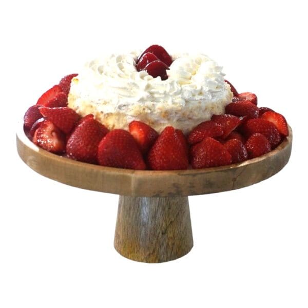 12" Cake stand staged with a cake and strawberries on a white background