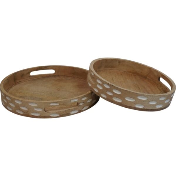 Set of two natural wood round serving trays with white oval accents on a white background