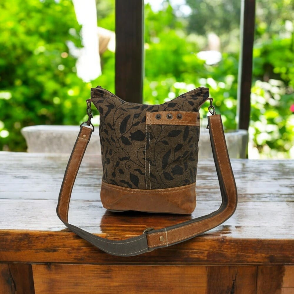 Crossbody bag in cotton canvas dark khaki green with light brown leather accents