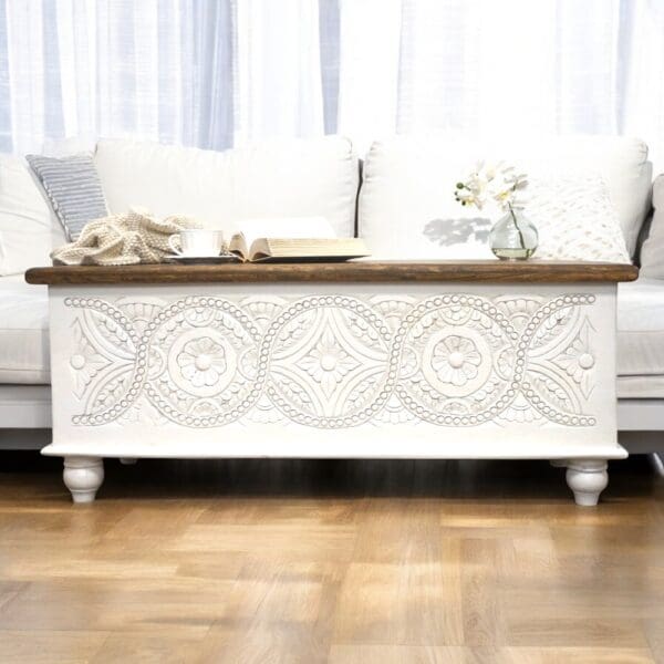 Solid wood large bench trunk with hand-carved mandala front panel. Fitted with anti slam lid hinges staged in a living room