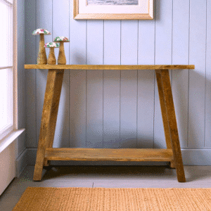 Hand-crafted in natural mango wood. simple Angle legged console table.