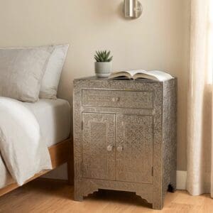 Hand-crafted metal embossed nightstand stage in a bedroom